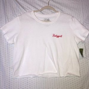a basic, cropped white tee, babygirl on the chest